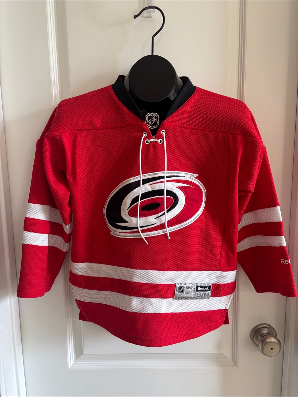 Reebok Red White Carolina Hurricanes Hockey Jersey Youth size S/M NHL licensed